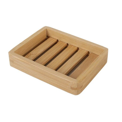 Light brown bamboo soap holder with slotted surface