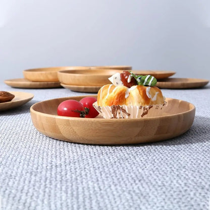 Round light brown bamboo plate with raised edge